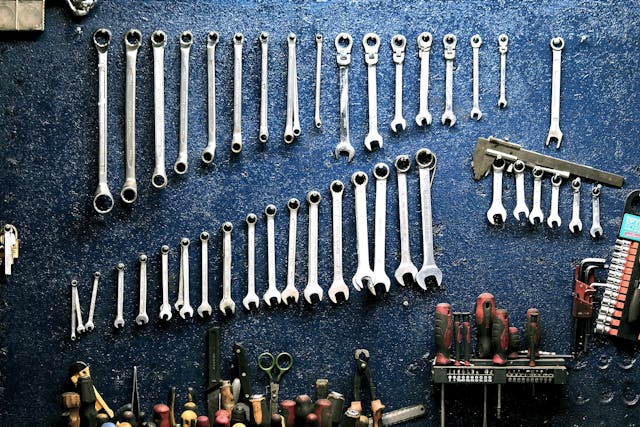 tools-artfully-arranged-with-a-navy blue-background